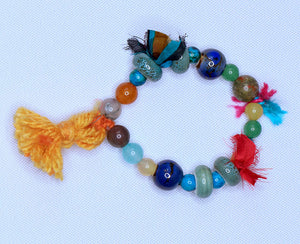 Mesmerizing and Colorful Beaded Bracelet with Orange Tassel - #0003