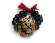 Load image into Gallery viewer, Hand Painted Jewelry Floral Mandala Pattern on Large Oval Stone with Black Beads and Gold Rectangular Beads with Red Tassels - #0066
