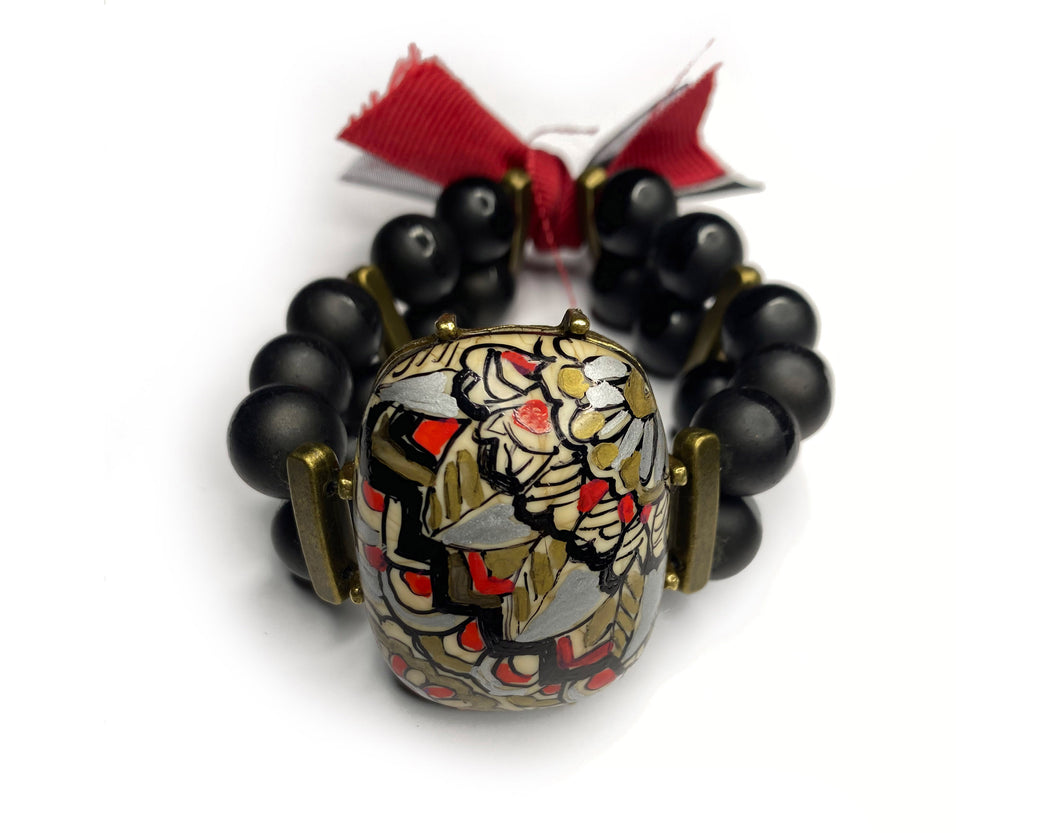 Hand Painted Jewelry Floral Mandala Pattern on Large Oval Stone with Black Beads and Gold Rectangular Beads with Red Tassels - #0066