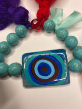 Load image into Gallery viewer, Shir-Zan. Double sided bracelet one side eye evil and one side Shir-Zan (Brave Women) with turquoise beads.
