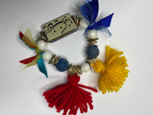 Load image into Gallery viewer, Double Sided Bracelet - 1) Red/White/Blue Evil Eye 2) This too shall pass in Farsi - Blue White silver Beads - Yellow and Red Tassels - Blue Ribbon - #0094
